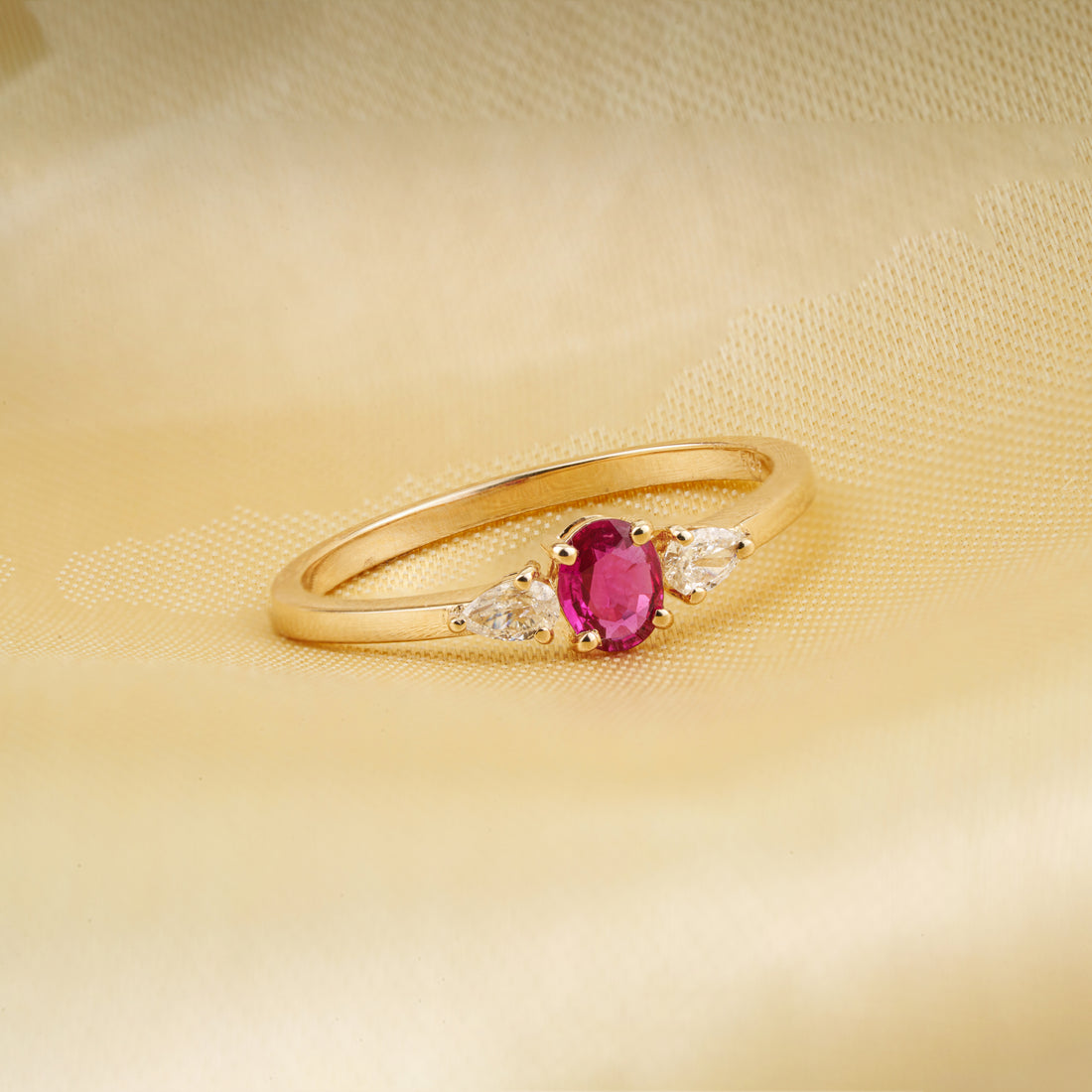 Ruby & Pear Diamond Three Stone Ring