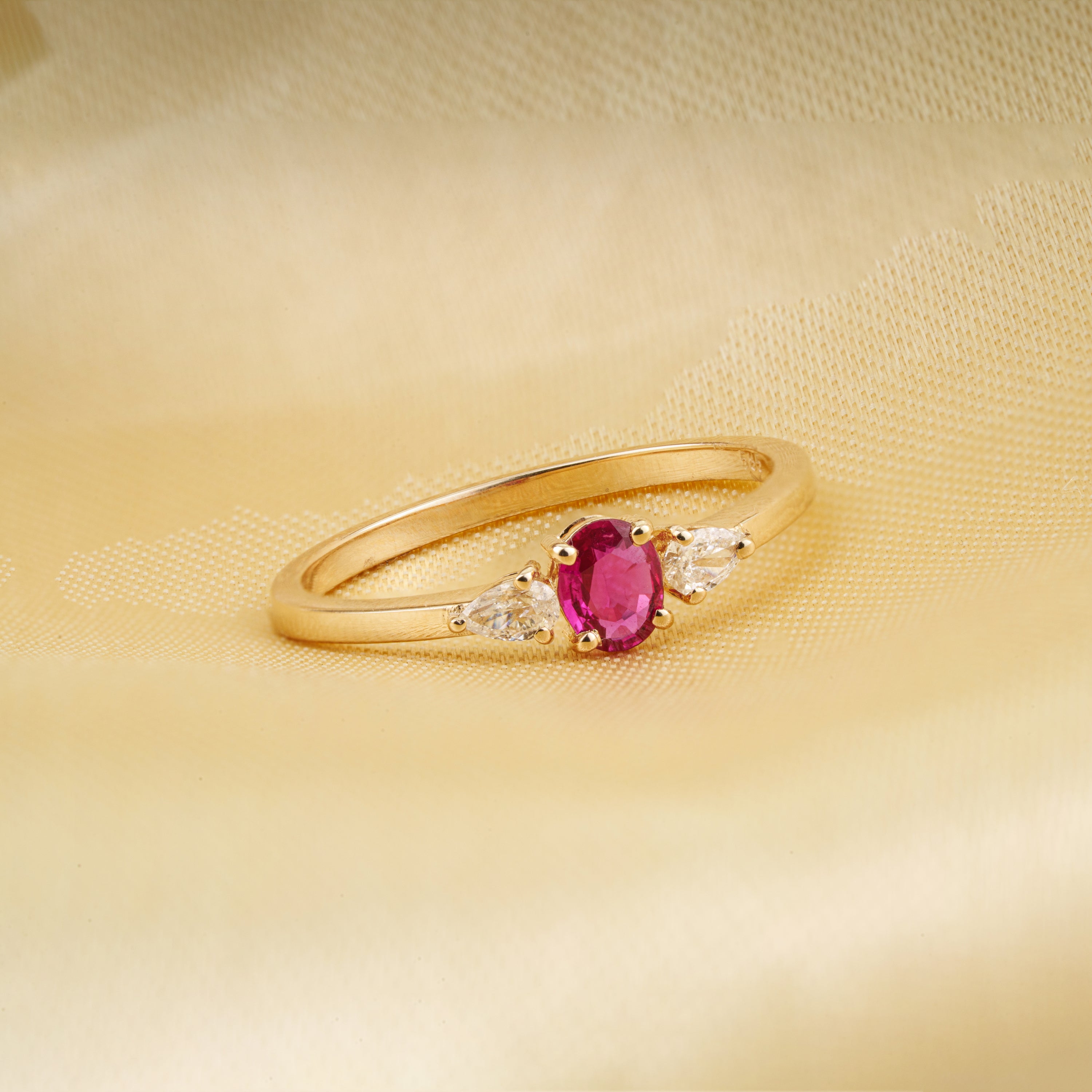 Ruby & Pear Diamond Three Stone Ring