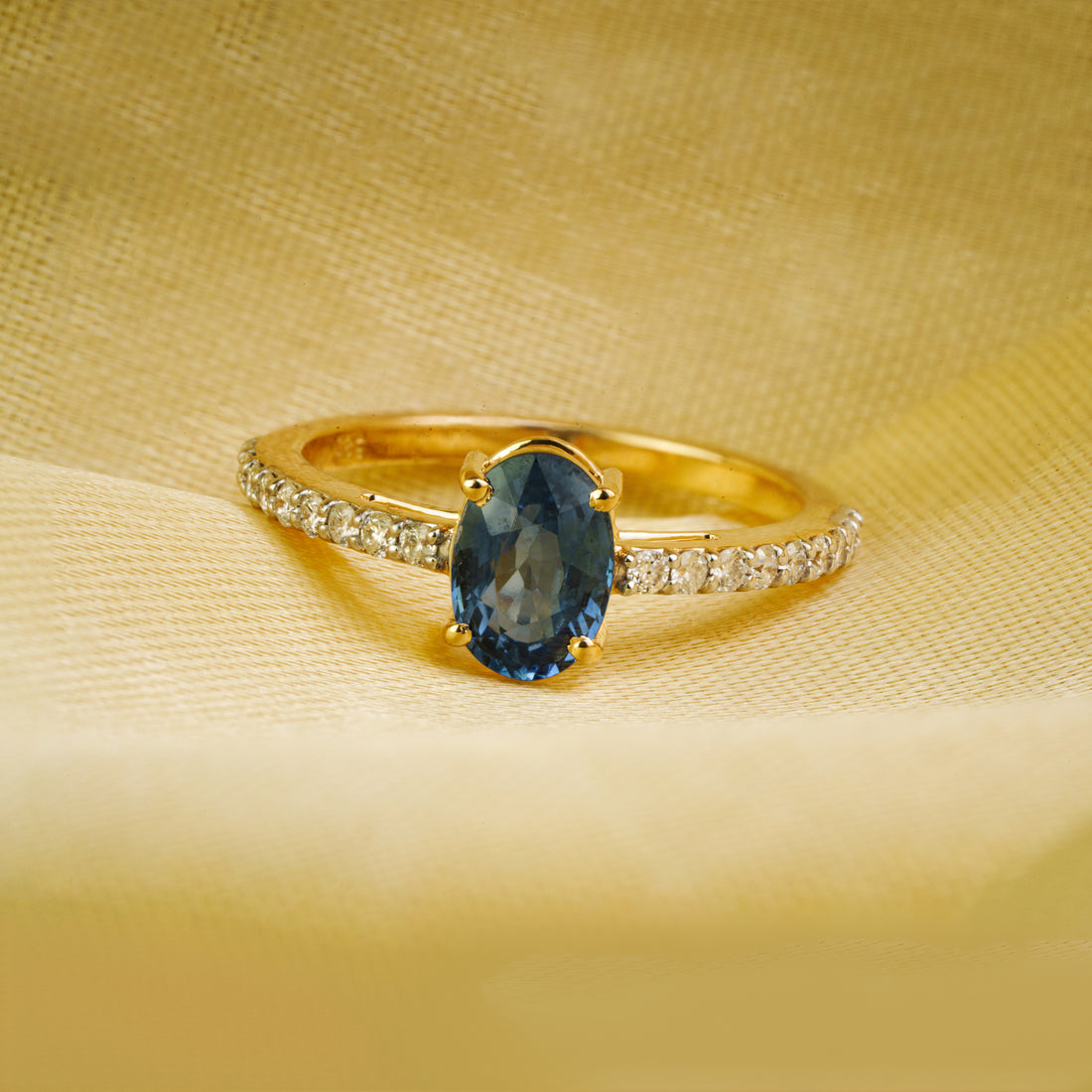 Oval Blue Sapphire Diamond Ring