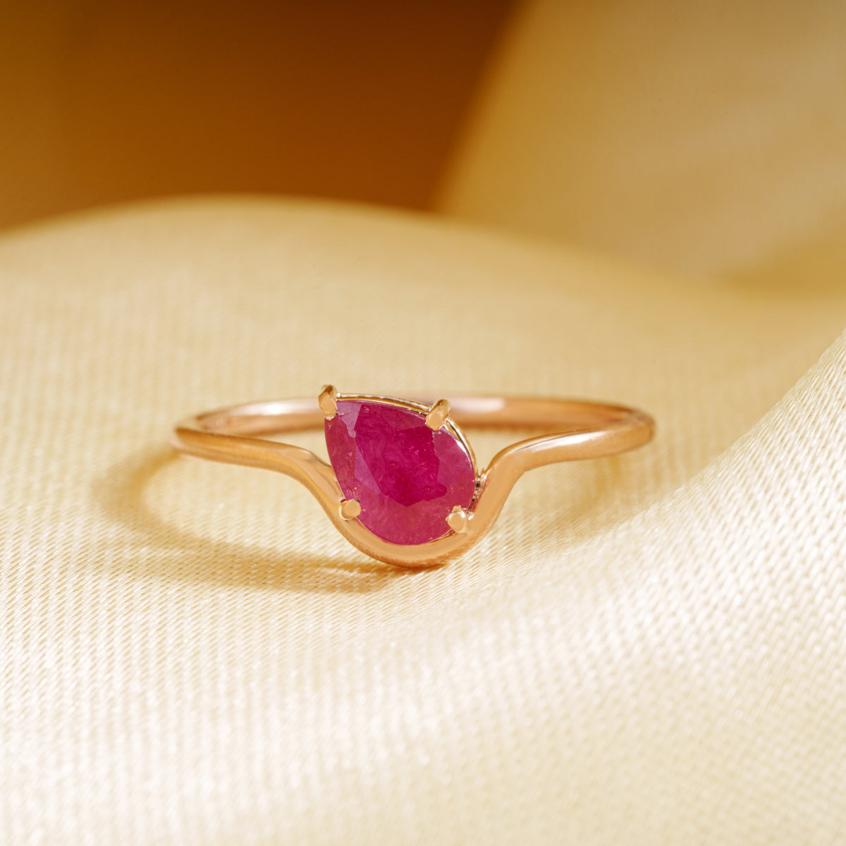 Pear Cut Ruby Solitaire Ring